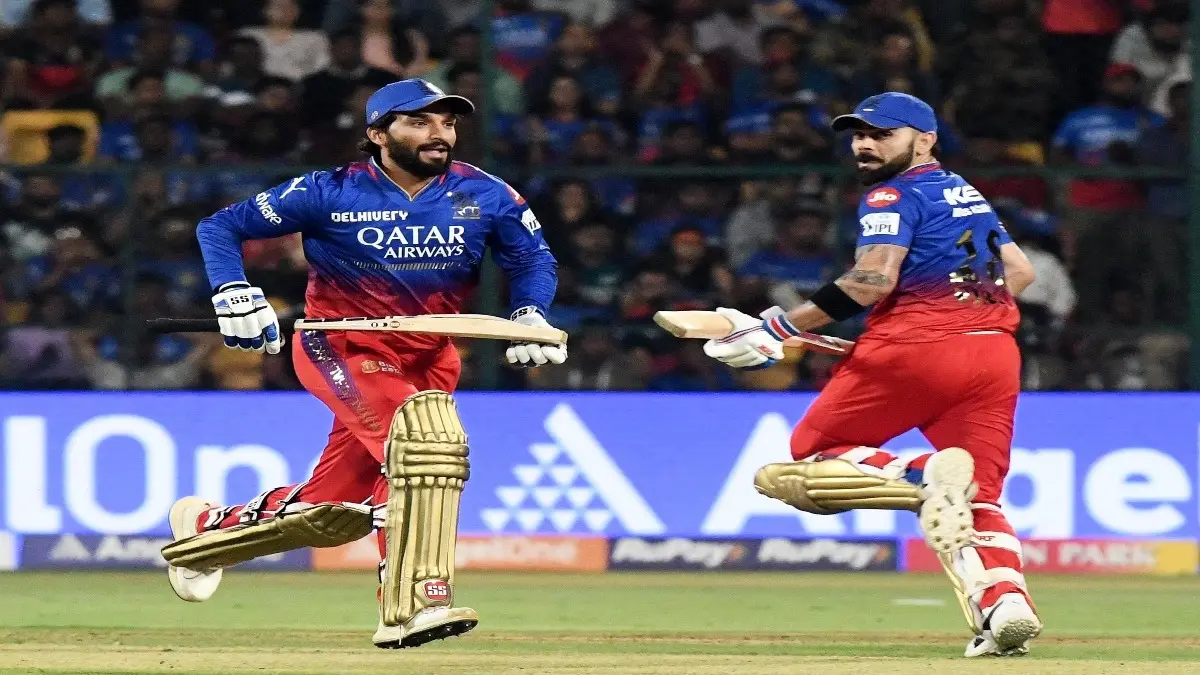 Virat Kohli and Rajat Patidar during an IPL game