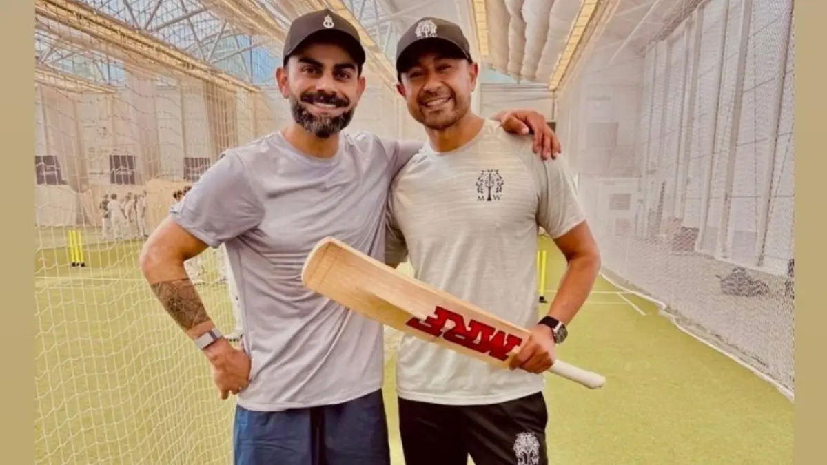 Virat Kohli with Naeem Amin