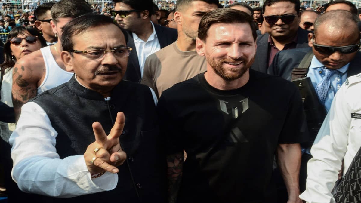 West Bengal Sports Minister Aroop Biswas with Lionel Messi
