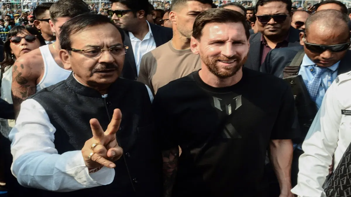 West Bengal Sports Minister Aroop Biswas with Lionel Messi