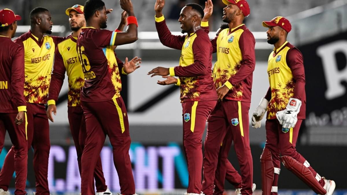 West Indies players celebrate after taking a wicket against New Zealand