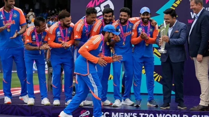 Rohit Sharma pulls out the Ric Flair swag, does the wrestler's iconic walk as he lifts the WC title Rohit Sharma mimics the famous swagger of Ric Flair as India wins the T20 World Cup.