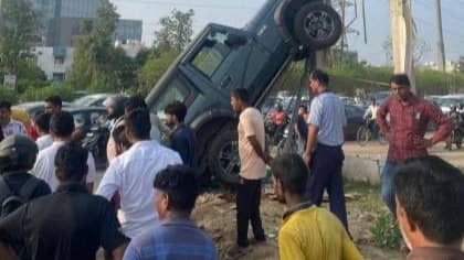 SUV Collides with Speeding Sedan, Climbs Up Electric Pole In Gurugram ...