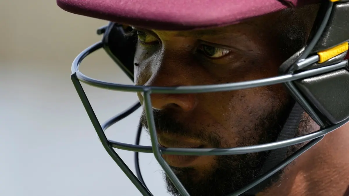 WI skipper Roston Chase walks back to the dressing room after being dismissed