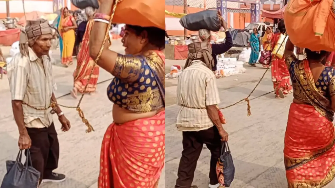 Wife ties husband with rope in Mahakumbh