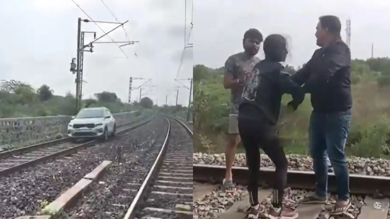 Woman drove car on railway tracks in Telangana.