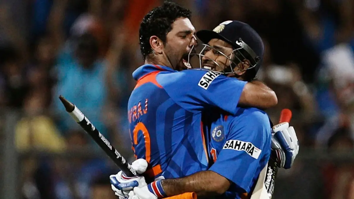 Sachin Tendulkar Reveals The Untold Story Behind MS Dhoni's Promotion Over Yuvraj Singh In 2011 World Cup Final Yuvraj Singh and MS Dhoni celebrate India's 2011 ODI WC Win