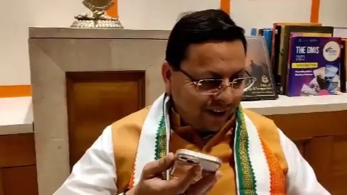 CM Dhami called toppers