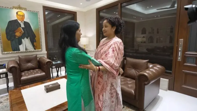 kalpana (Floral print Attire) and Sunita kejriwal (Green)
