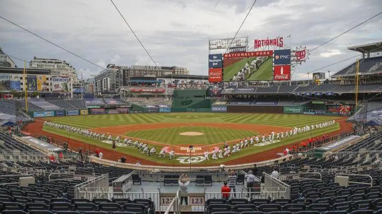 Yanks, Nats kneel in Black Lives Matter salute; Fauci's toss