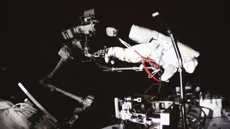 China's 2 astronauts go on a four-hour spacewalk outside new Tiangong station; Watch China