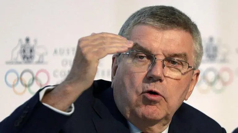 Delay costs IOC 'several hundred million'; Japan pays rest