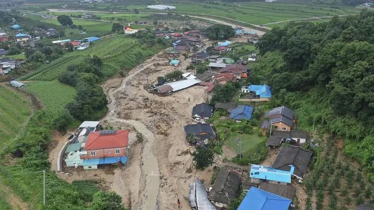 Rains in South Korea cause landslides and flash floods, 7 bodies pulled from flooded road tunnel Rains in South Korea
