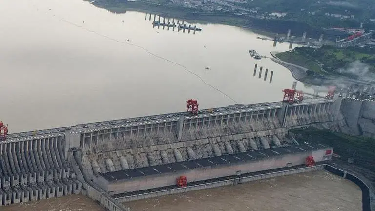 China blasts dam to release floodwaters as death toll rises