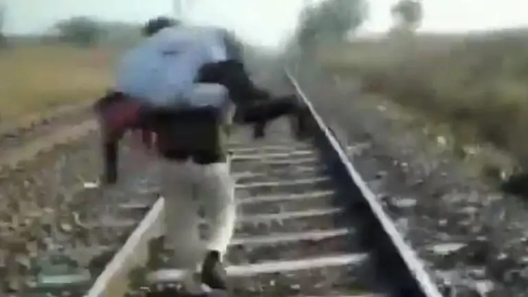 WATCH: Madhya Pradesh constable carries injured man on shoulders for 1.5 km on tracks, saves life