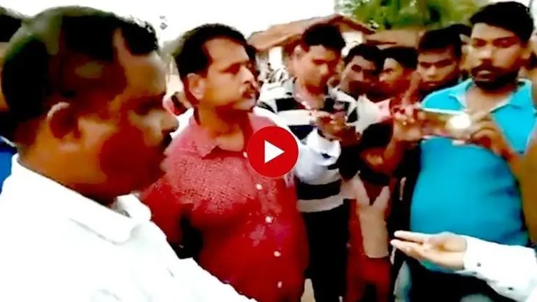 BJD MLA forces PWD engineer to publicly do sit-ups for poor road contruction BJD MLA forces PWD engineer to publicly do sit-ups for poor road contruction