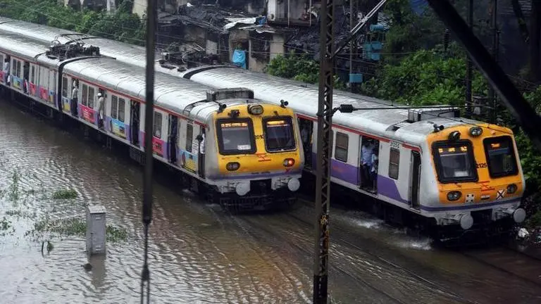 Mumbai Rains UPDATE and Weather Forecast: Mumbai's local train services impacted by heavy rains, access route and operational details here Mumbai Rains UPDATE and Weather Forecast: Mumbai's local train services impacted by heavy rains, access route and operational details here