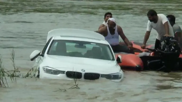 Upset Haryana Man sinks BMW in river as father refuses to buy him a Jaguar Upset Haryana Man sinks BMW in river as father refuses to buy him a Jaguar