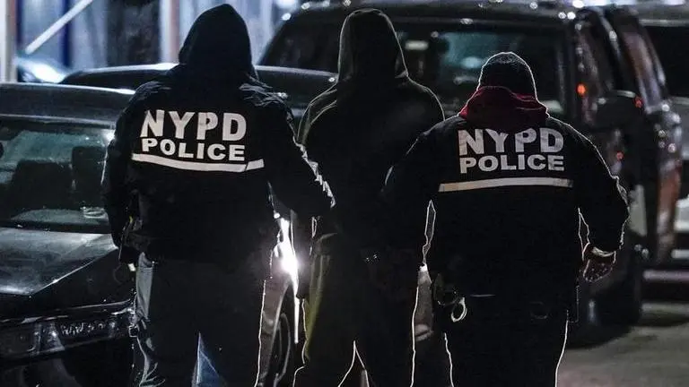 New York police arrest two men in connection with killings linked to nightclub robberies New York