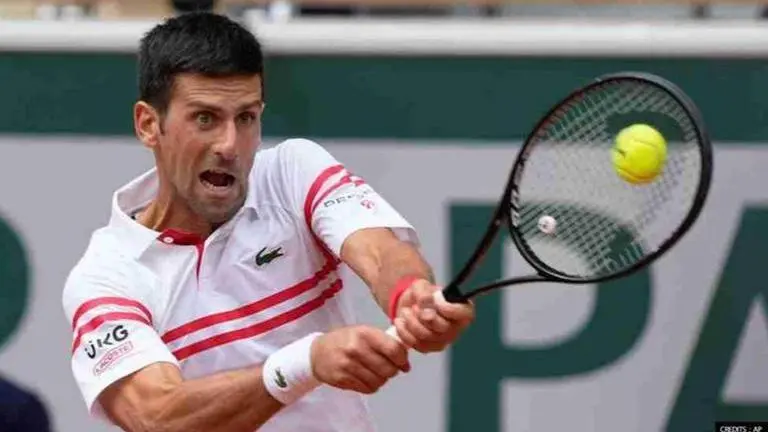 Novak Djokovic's visa revoked by Australian govt, faces deportation before Australian Open Novak Djokovic, Novak Djokovic visa, Novak Djokovic deportation, covid vaccine, Novak Djokovic news, Djokovic covid vaccine, Australia Open 2022
