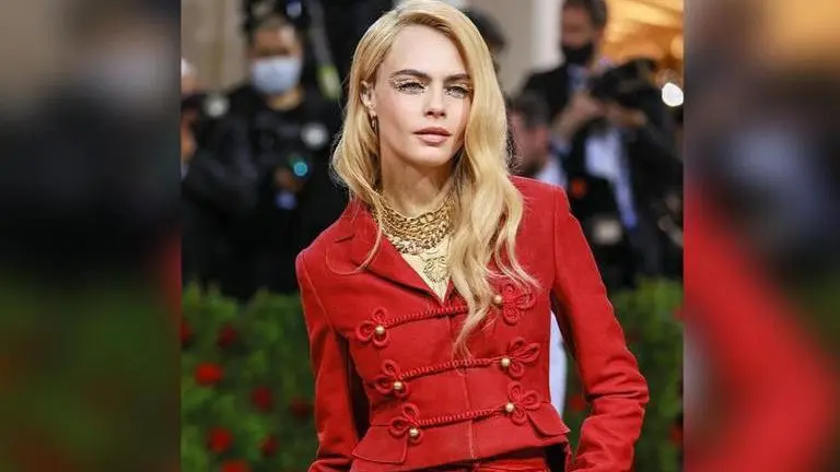 Met Gala 2022: Cara Delevingne exudes boss lady vibes in red suit with golden twist Met Gala 2022