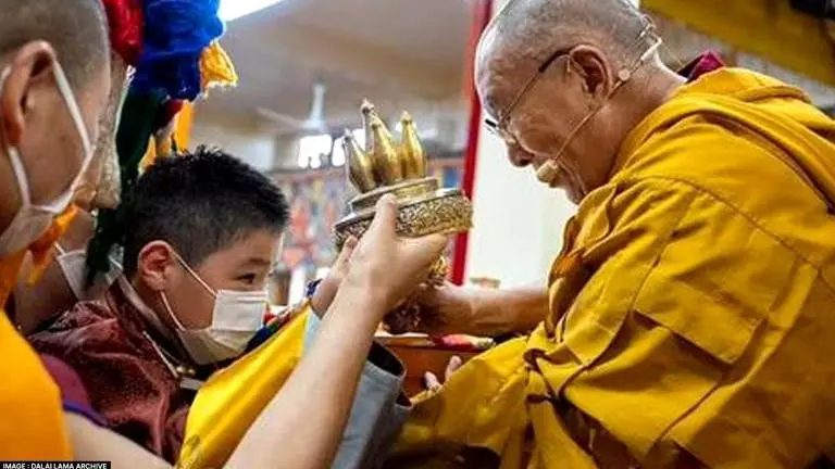 Dalai Lama meets Mongolian child revealed as reincarnation of Tibetan Buddhism leader Dalai Lama