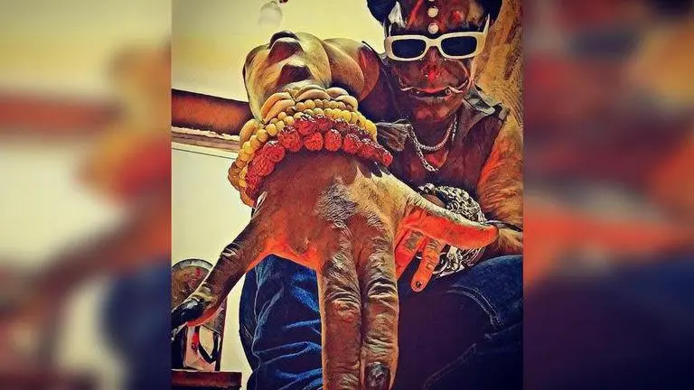 Brazilian body modification addict cuts off 2 fingers, adds two silver tusks to his teeth Body modification addict