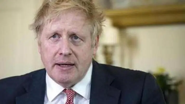 UK PM Johnson launches new COVID-19 alert system as lockdown rules 'modified'