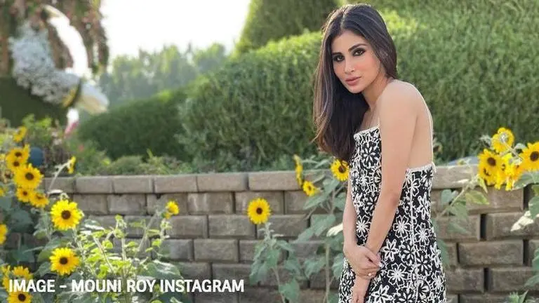 Mouni Roy is a vision in white as she shares throwback pics from "happier times" Mouni Roy
