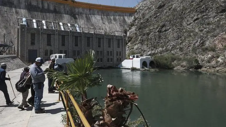 Mexican president vows to pay US water debt, thanks Trump