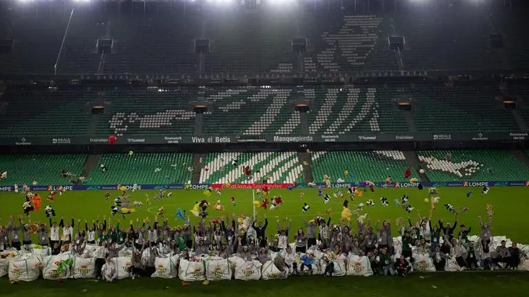 Real Betis fans throw thousands of toys onto the pitch for underprivileged children; WATCH Real Betis