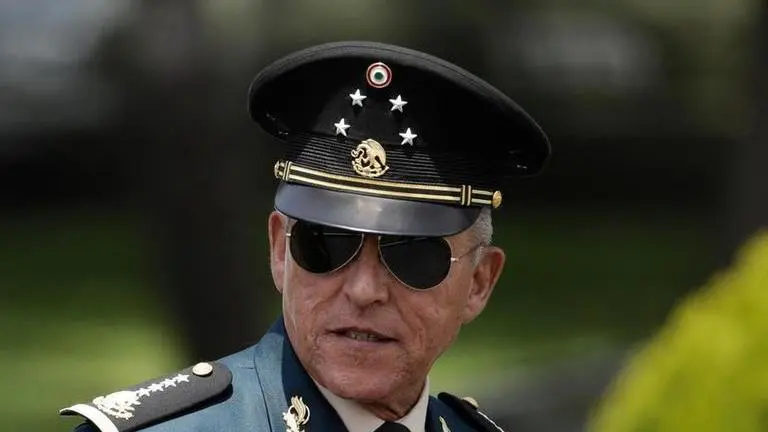 Mexico publishes heavily edited probe of exonerated general