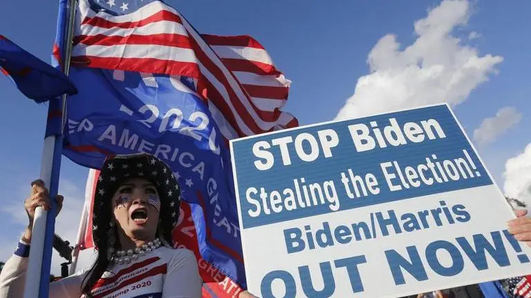 US: Cheers as anti-Biden banner waved in Capitol breach