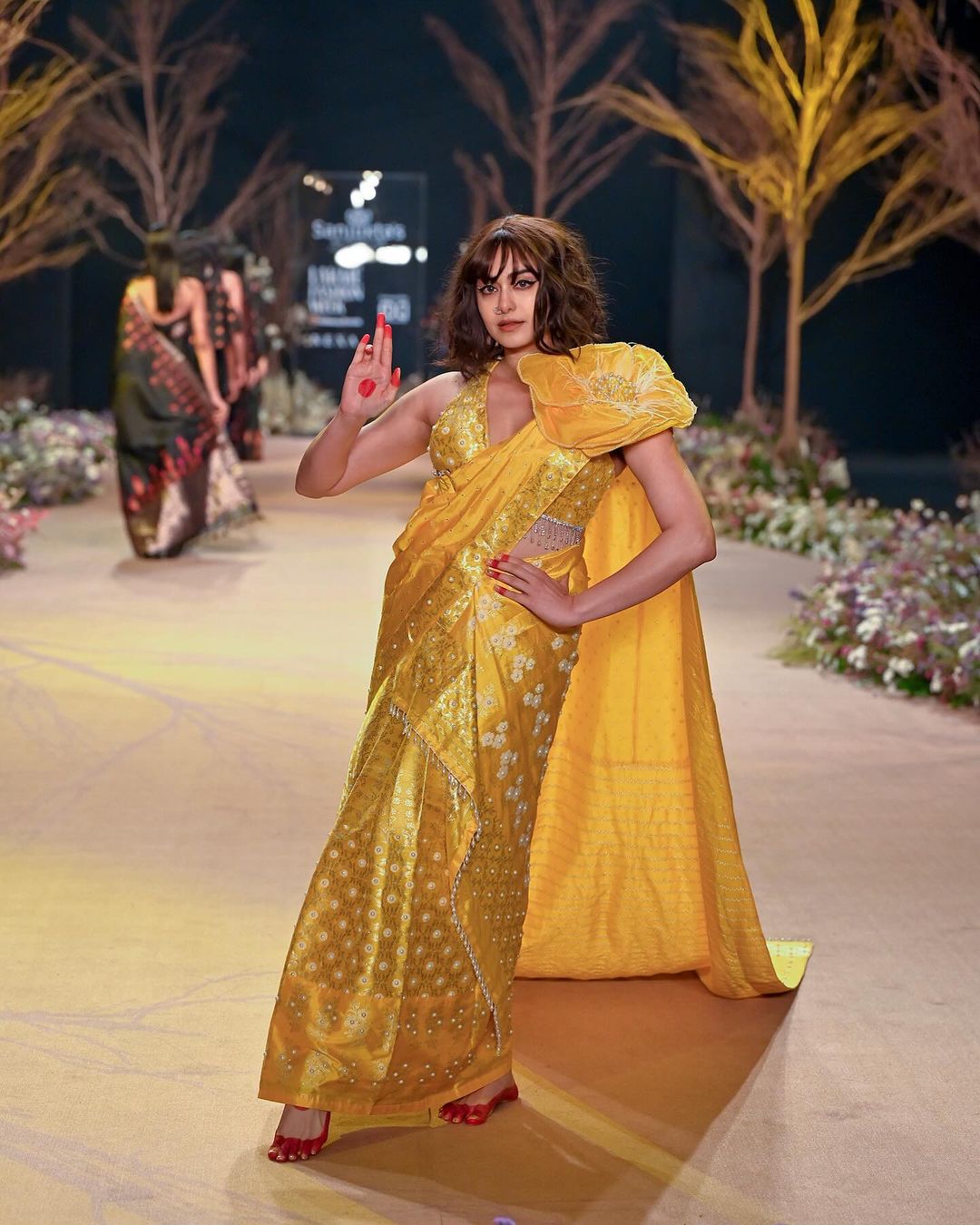 Lakme Fashion Week 2023: Adah Sharma Radiates Festive Elegance in Yellow  Saree - Filmibeat