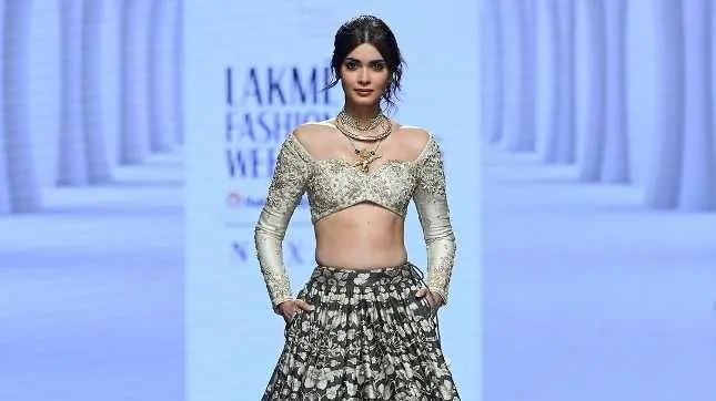 Lakme Fashion Week Day 5: Diana Penty walks for Paulmi and Harsh in ornate black and gold lehenga Diana Penty at Lakme Fashion Week