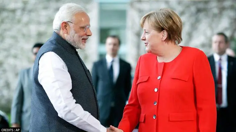 PM Modi talks to Germany's Angela Merkel about Afghanistan situation post Taliban siege Afghanistan crisis