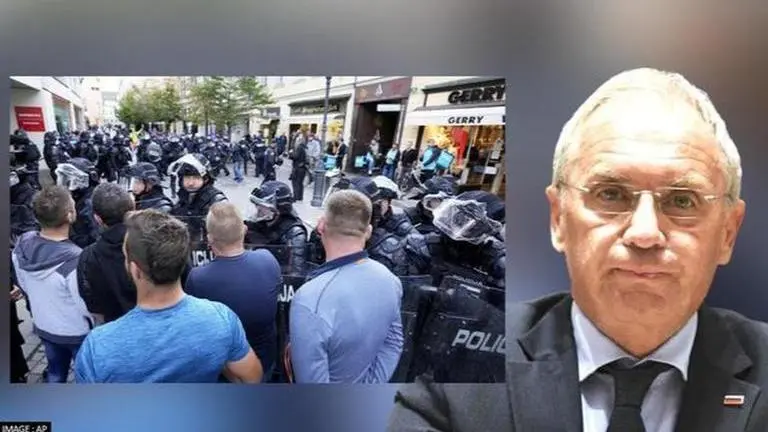 Slovenia Min denies use of excessive police force during protests against COVID passes Slovenia