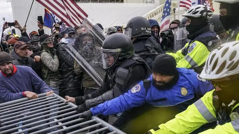 US Capitol violence: Woman dies after being shot during insurrection