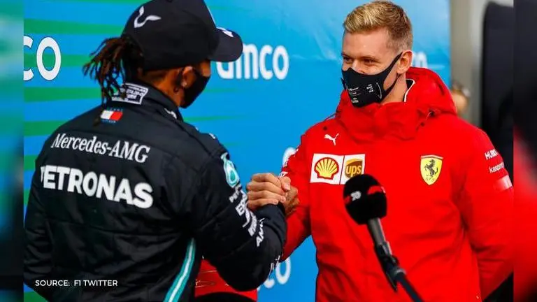 Lewis Hamilton honoured with Michael Schumacher's helmet after record-equalling 91st win lewis hamilton