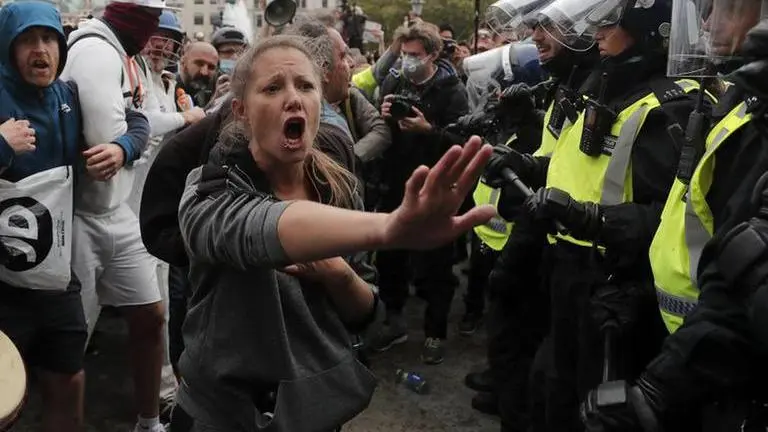 Police clash with protesters at UK COVID-19 demonstration Police clash with protesters at UK COVID-19 demonstration