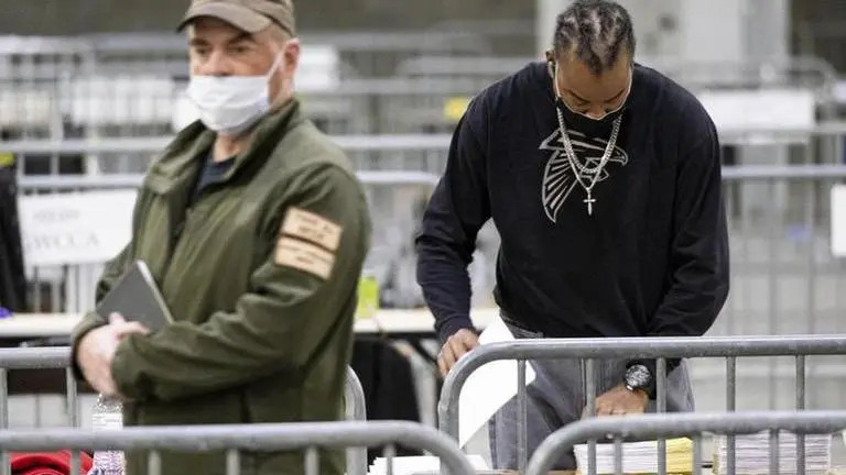 EXPLAINER: How Warnock won 1 of Georgia's 2 Senate runoffs EXPLAINER: How Warnock won 1 of Georgia's 2 Senate runoffs