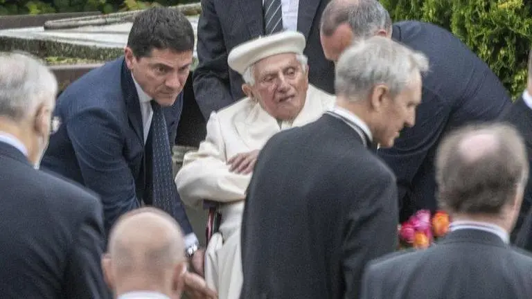 Retired pope visits old haunts, parents' grave in Germany