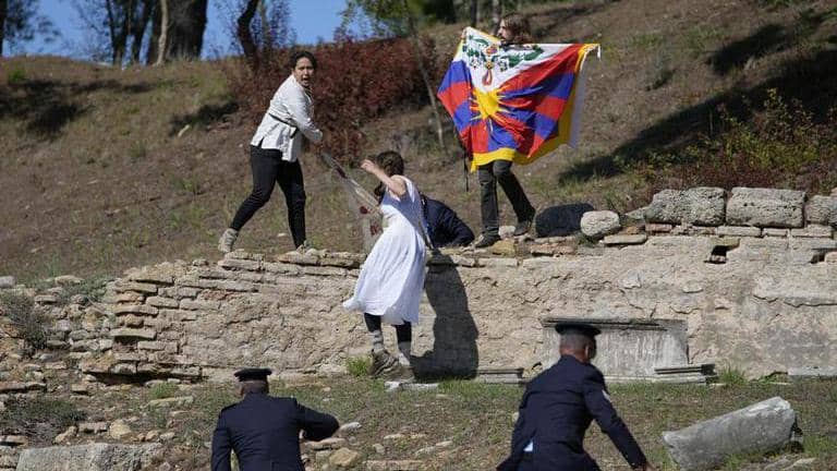 Protesters disrupt flame lighting for Winter Games | Republic World