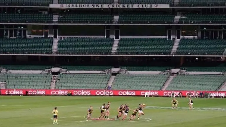 Australia football body slashes staff as virus shutdown bites Australia