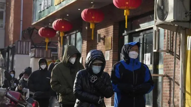 China's healthcare system & medical workers under strain amid COVID-19 spike: Report China