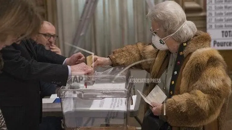 France holds local elections despite virus lockdown
