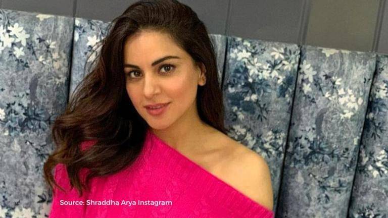 Shraddha arya gives a peek into her current read while posing in her lawn; see picture