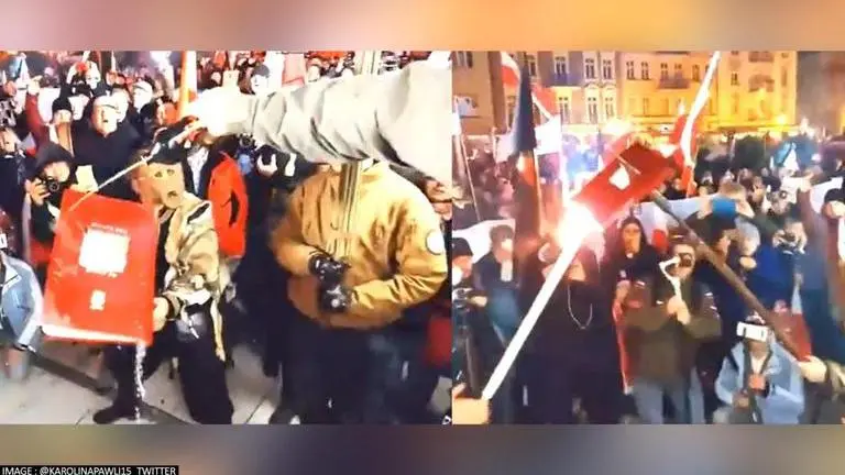 Poland's anti-Semite nationalists burn books on Jewish rights at Independence Day rally Poland