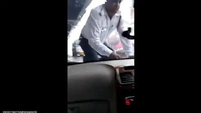 WATCH: Delhi man drags traffic police on car’s bonnet for 2 kms to escape paper check Delhi