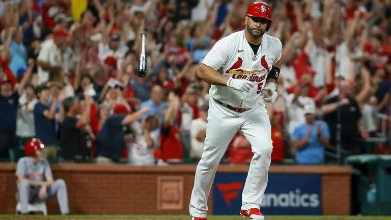Albert Pujols hits 698th homer, helps Cards beat Reds 6-5 Albert Pujols